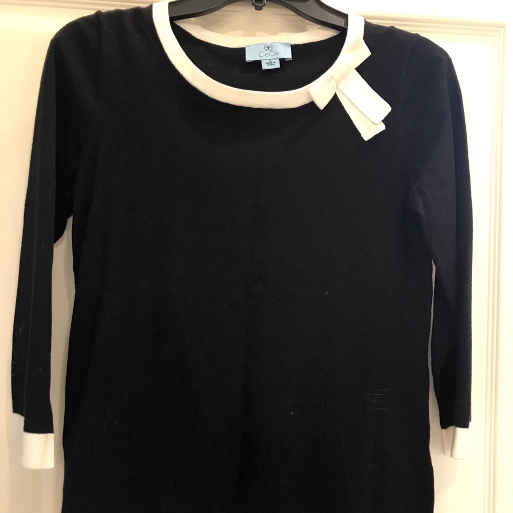 Elegant and cool black-and-white sweater